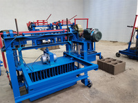 Machine de levage automatique Machine de fabrication de briques de ponte en béton à chaîne Machine mobile de fabrication de blocs de pavage en ciment