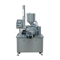 Machine d'emballage de gobelets pour sauces et miel avec remplissage rotatif automatique, dosage et scellage thermique de gobelets en plastique et film aluminium pour produits alimentaires