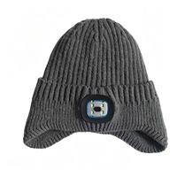 Bonnet tricoté unisexe avec lampe frontale LED rechargeable par USB et cache-oreilles, personnalisable avec logo, de notre usine avec 17 ans d'expérience