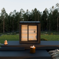 Sauna extérieur en bois de cèdre rouge massif, très demandé, avec toit en pente, verrière panoramique et poêle électrique pour jardin familial