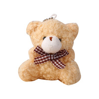 Vente en gros de mini pendentifs mignons en forme d'ours avec nœud papillon, en peluche, en matériau PP, pour sacs, porte-clés de voiture, accessoires, porte-clés
