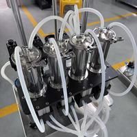 Remplisseuse de liquides sous vide semi-automatique pneumatique Zhongjie à 4 têtes pour cosmétiques et parfums, machine d'embouteillage, emballage en cartons, 10-500 ml