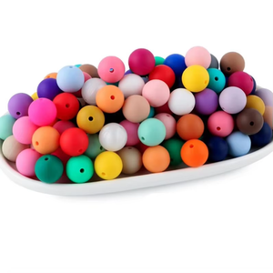 Vente en gros de bonne qualité bébé à mâcher sans BPA ficelle de dentition ronde colorée opale 12mm en silicone caméléon perle - Product Image 1