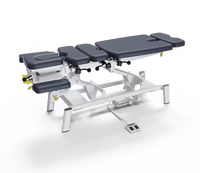 Table d'opération de physiothérapie électrique professionnelle pour lit chiropratique de soins sportifs