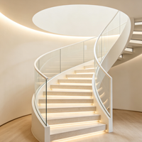 Escalier courbé en pierre aspect marbre avec éclairage LED pour salon intérieur, décoration intérieure de villa et d'hôtel sur mesure Wharton