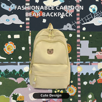Sac à dos en nylon souple pour lycéennes, imperméable, tendance, motif ours de dessin animé, avec ceinture à coussin d'air et fermeture éclair – Stock disponible dès maintenant