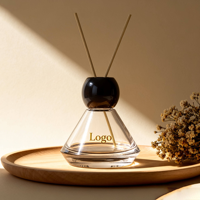 Bouteilles de diffuseur d'aromathérapie rondes personnalisées de 100 millilitres pour la décoration de la maison ; Bouteilles de diffuseur en verre parfumé de 4 onces