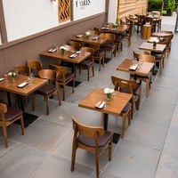 Ensemble de table à manger moderne pour restaurant avec marbre, bois, métal et cuir - Meubles commerciaux durables et écologiques pour usage hôtelier