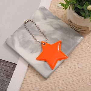 Pendentif étoile réfléchissant KJG07 en PVC, breloque de sécurité extérieure pour la randonnée, le cyclisme et l'utilisation nocturne - Product Image 1