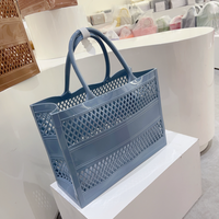 Panier de shopping tendance été 2025, sac en gelée portable, grande capacité, panier de rangement, panier de plage élargi, creux