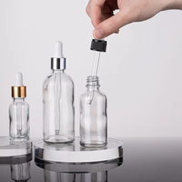 Flacon compte-gouttes en verre transparent de 30 ml, directement de l'usine, avec emballage en boîte sérigraphiée pour huiles essentielles, parfums, sérums cosmétiques