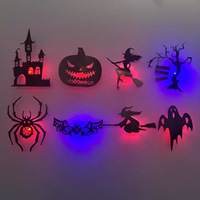 Décorations d'Halloween : 12 autocollants muraux LED lumineux (Citrouille, Sorcière, Chauve-souris, Fantôme, Araignée, Maison Hantée, Arbre Mort)