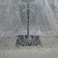 Nouvelle robe de mariée de style européen haut de gamme, brodée de perles et de paillettes, en tissu de dentelle fait main