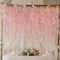 LUYI Vente en gros d'usine de fleurs artificielles en soie faites à la main guirlande de vigne suspendue mixte mariage maison jardin