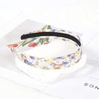 Vente en gros de bandeaux floraux élégants et larges en français Bandeau imprimé de fleurs mignon pour printemps et été Accessoires de cheveux pour femmes