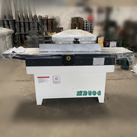 Machine de rabotage de dégauchisseuse à bois avec tête de coupe en spirale et composants du noyau du moteur.