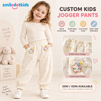 Smiledotkids Pantalons de jogging personnalisés pour enfants, imprimé cœurs, poches à rabat avec motifs animaux mignons, ourlet à volants, OEM ODM, vente en gros pour petites filles