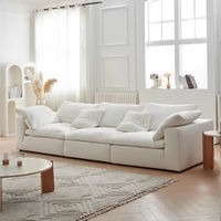 Großhandel auf Lager: Modernes L-förmiges 4-Sitzer Cloud Modulsofa-Set, waschbares weißes Stoff-Ecksofa für das Familienwohnzimmer