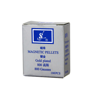 100 Uds. Cuentas magnéticas doradas terapia auricular punto del oído acupuntura pegatinas para oídos masajeador corporal semillas - Product Image 1