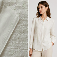 Tissu en crêpe extensible en polyester froissé doublement laminé à carreaux jacquard 3D