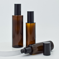 Bouchon noir Anti-UV flacon en verre ambré parfum huile essentielle bouchon en aluminium vaporisateur bouteille ronde longue et fine avec pompe à Lotion