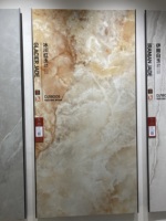 Carreaux de sol en porcelaine effet marbre pleine masse Guangdong Foshan Huanai 900x1800mm, finition noire brillante, antidérapants, épaisseur 9mm