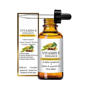 La vitamina E di grado professionale naturale al 100% migliora l'olio con gli oli di Jojoba E Avocado produce olio per la cura del viso al collagene ed elastina
