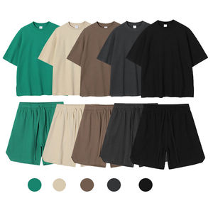 Conjunto de Dos Piezas Unisex de Algodón, Camiseta de Cuello Redondo y Pantalones Cortos con Cintura Elástica, Color Sólido, Corte Holgado, Ropa Casual de Verano - Product Image 1