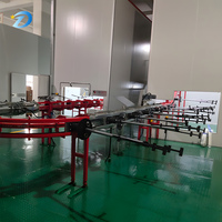 Système de pulvérisation robotique automatique pour réservoir de carburant de moto Solution clé en main pour les machines de revêtement métallique Ligne de peinture efficace