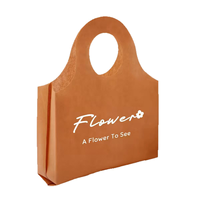 Sac fourre-tout en non-tissé épaissi avec poignée à trous ronds, sac cadeau de boutique haut de gamme, sac de rangement réutilisable pour exposition, vente en gros