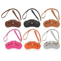 Vente en gros Sac de rangement pour lunettes en cuir PU Étui pour lunettes de soleil portable pour l'extérieur avec dragonne et longue lanière