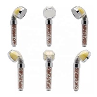 Pommeau de douche filtrant à haute pression à la vitamine C pour l'élimination de l'eau dure et du chlore |   Pommeau de douche filtrant ionique parfumé aux arômes
