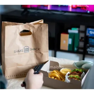 生态博尔萨斯纸质食品开展纸袋模切手柄棕色牛皮餐饮纸袋，配有餐厅定制标志