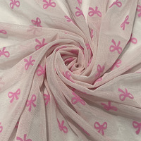Tissu extensible en maille floquée rose avec nœud papillon pour lingerie
