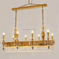 Lustre rectangulaire européen en cristal sculpté doré avec chaîne de bougies suspendues pour l'éclairage des espaces de restauration d'hôtel
