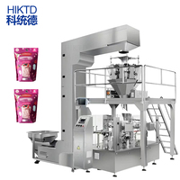 Machine de remplissage et de scellage entièrement automatique rotative à huit postes pour l'emballage de sachets stand-up, doypacks et pochettes à bec verseur