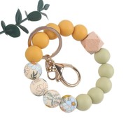 Meistverkauftes Eichenholz Unregelmäßig Gewebtes UV-Bedrucktes Baumwoll-Perlen-Münzhalter Schlüsselanhänger Armband