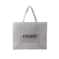Sac non tissé laser de luxe imprimé de logo personnalisé Sac fourre-tout réutilisable pour les courses