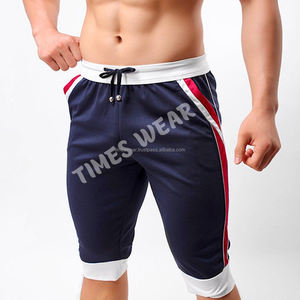 กางเกงขาสั้นผ้าคอตตอน/โพลีเอสเตอร์สำหรับผู้ชายมีกระเป๋าลายทึบกันรอยยับมีบริการ OEM - Product Image 1