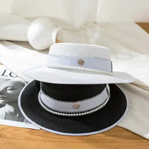 Chic Ladies Sombrero de paja de ala ancha Plano Simple Estilo europeo occidental Sombrero de verano Sombreros Sun Pearl Top Sombreros de paja