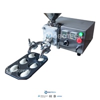 Machine d'injection de crème, pâte, confiture et sauce chocolat de haute qualité pour la garniture des puffs, churros, puddings, gâteaux et croissants