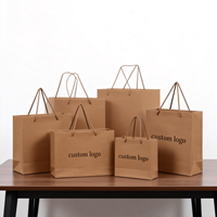Vente chaude Sacs cadeaux en papier kraft avec logo personnalisé, cartes en carton argenté, carton ivoire pour vêtements, shopping, bijoux, montres