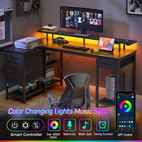 Bureau de jeu en métal en forme de L moderne et réversible avec tiroirs, prises électriques, éclairage LED, étagères de rangement, design d'angle, bureau d'ordinateur