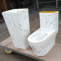 WC en céramique noir et or avec finition brillante de luxe pour salle de bain
