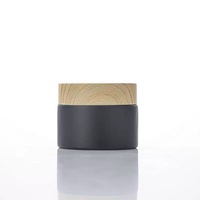 Vente en gros de pots en verre noir givré de 5 à 100 g avec couvercle en bois, pots cosmétiques pour crème, maquillage des yeux, stockage