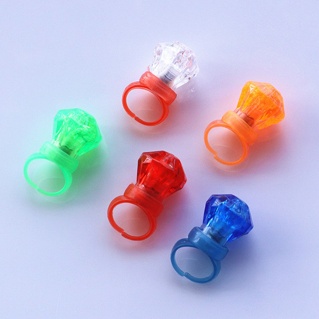 Wholesales Funny Small Flashing Led Light up Ring Toys Finger Ring Grow in the Dark Jelly Rings