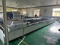 Machine de découpe et d'étalement de tissu intégrée à commande PLC entièrement automatique à double ligne pour le textile domestique