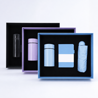 Ensemble cadeau d'affaires avec carnet A6, tasse isotherme de 200 ml et parapluie pliable pour personnalisation de marque