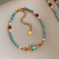 Parure de bijoux de luxe léger pour femme, collier ras du cou et bracelet en cuivre plaqué or véritable, ornés de perles et d'agate rouge turquoise