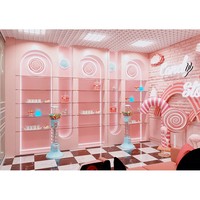 Meubles de magasin de bonbons roses, éclairage LED moderne, écologiques, robustes, durables, stand de vente de bonbons, étagères de présentation de desserts